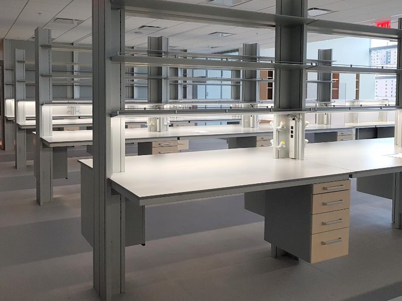 Laboratory workstations with epoxy tops on white casework
